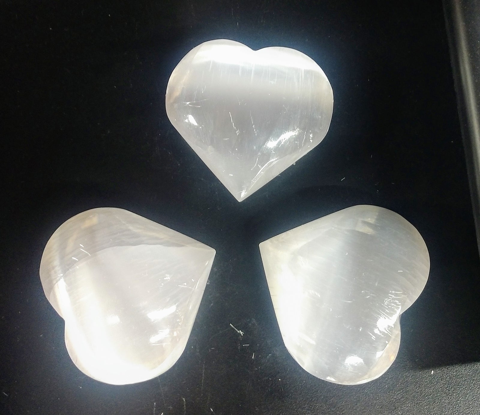 A protective stone, Selenite shields a person or space from outside influences. Selenite is a crystallized form of Gypsum, which is used for good luck and protection. The powerful vibration of Selenite can clear, open, and activate the heart and higher chakras and is excellent for all types of spiritual work. It's also excellent for clearing your aura and other crystals. by Buddha Gear