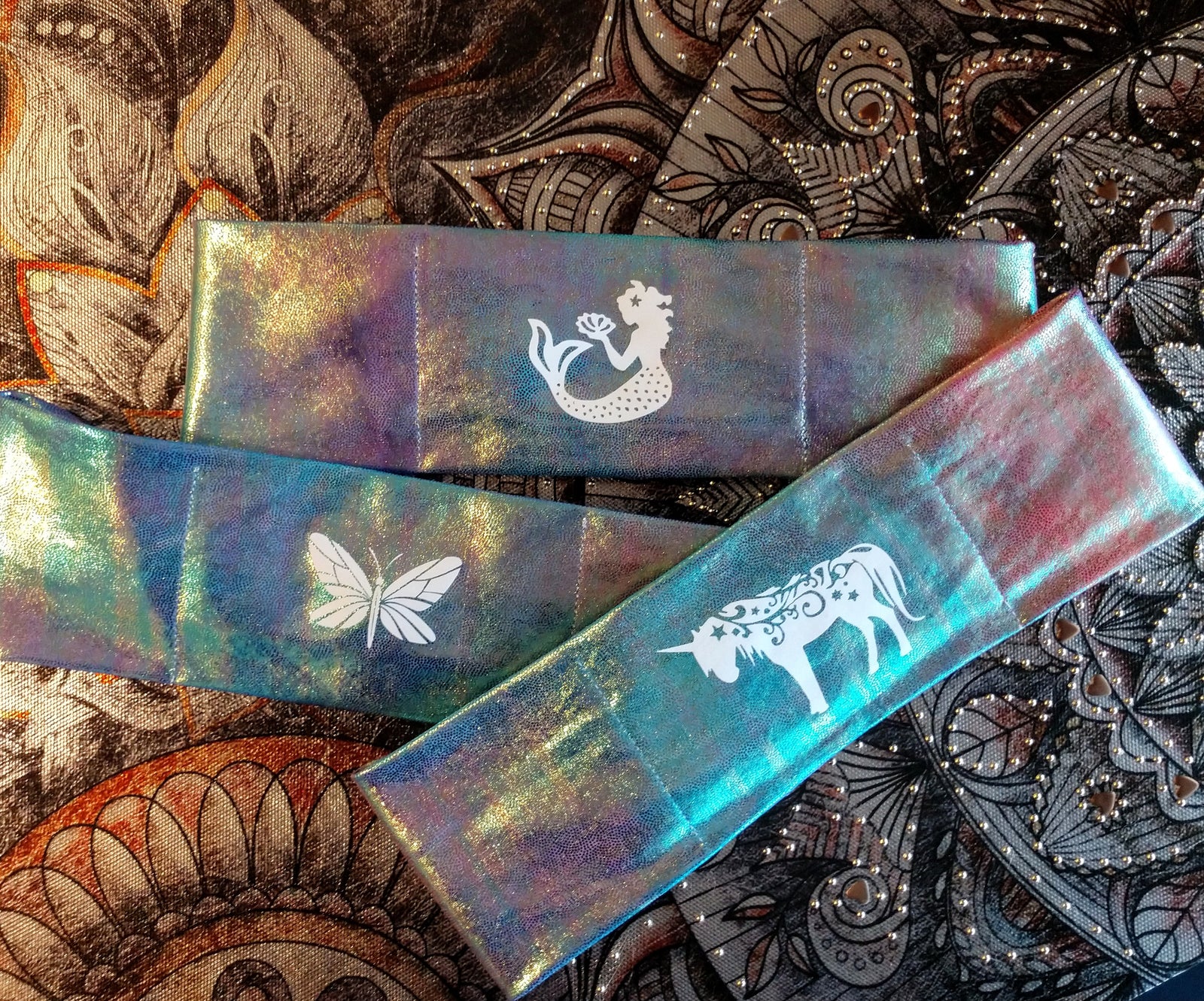 Buddha Gear Buddha Bands Butterflies are deep and powerful representations of life. Many cultures associate the butterfly with our souls. In Christianity, the butterfly is a symbol of resurrection. Around the world, people view the butterfly as representing endurance, change, hope, and life.  Our original Buddha Band - Yoga, meditation headband has hidden pocket to hold a crystal over your third eye while you meditate, practice yoga or sleep.